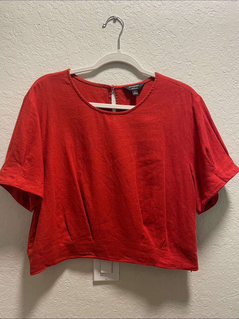 Women's Orange/Red Short Sleeve Crewneck Top and Skort set.